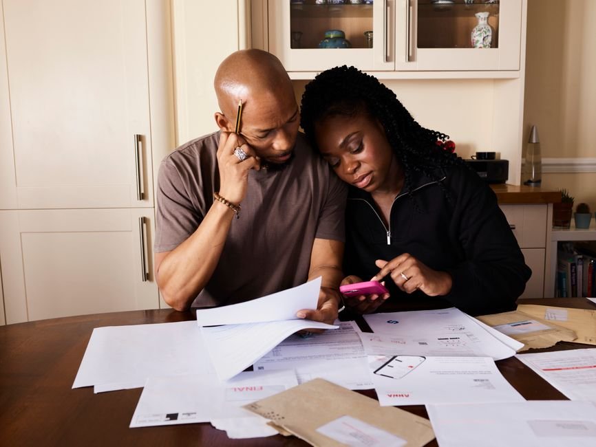 Veteran and spouse organizing records for a Seabees asbestos exposure VA claim