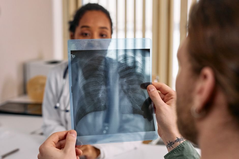 Physician explaining a pleural plaques VA disability rating finding on chest imaging